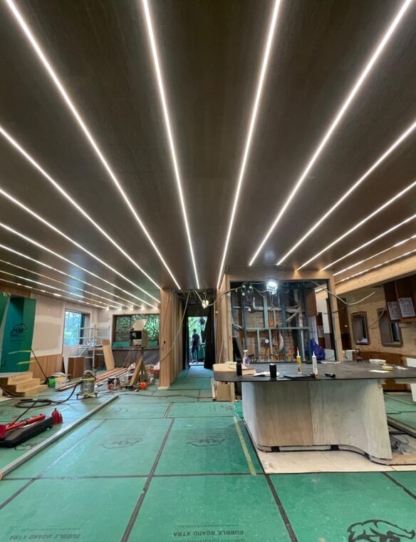 Custom joinery ceiling with recessed LED lighting, mid fit-off